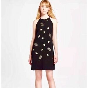 Victoria Beckham Black Dress with Gold Accents